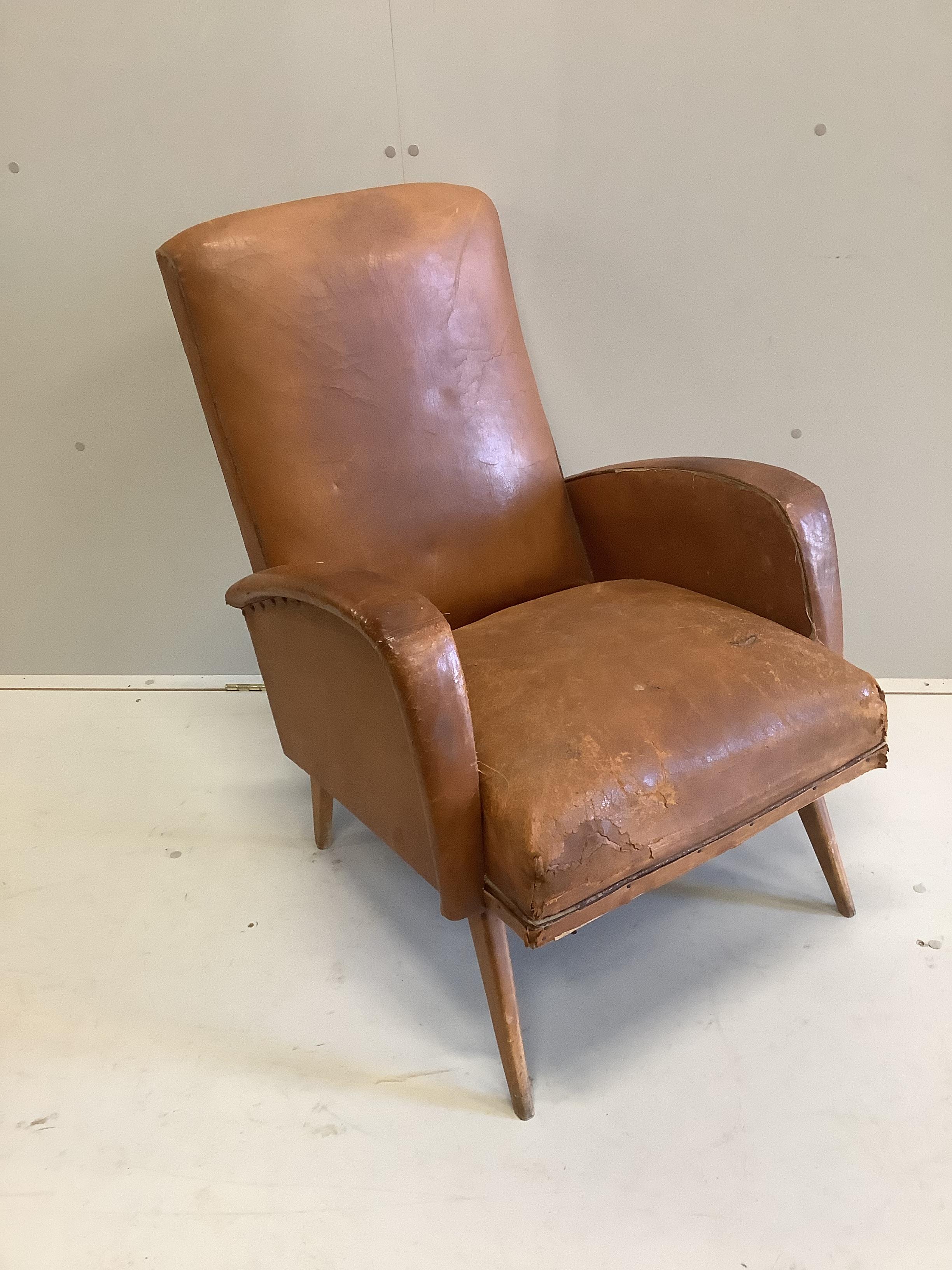 A mid century brown leather armchair, width 60cm, depth 68cm, height 84cm
